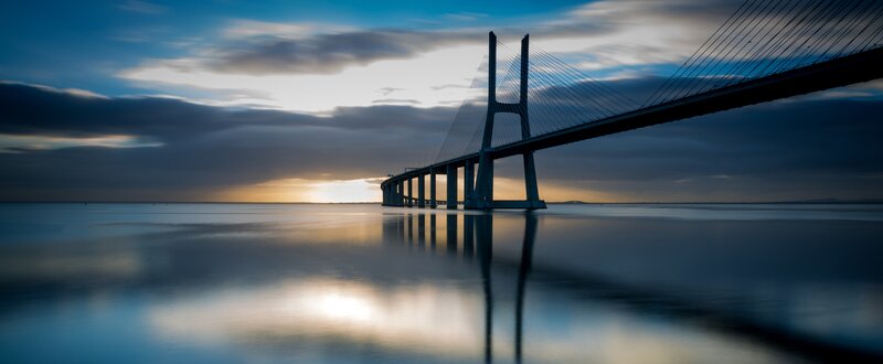 Sagres Bridge at Sunset — Blue, Serene, Photograph, Sky