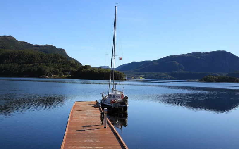 Sailboat at a wooden dock