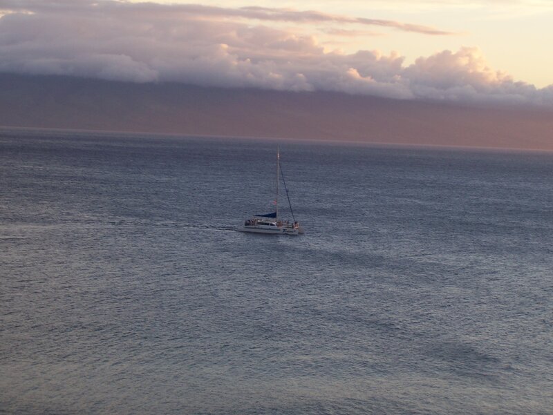 Sailboat at dusk on the ocean