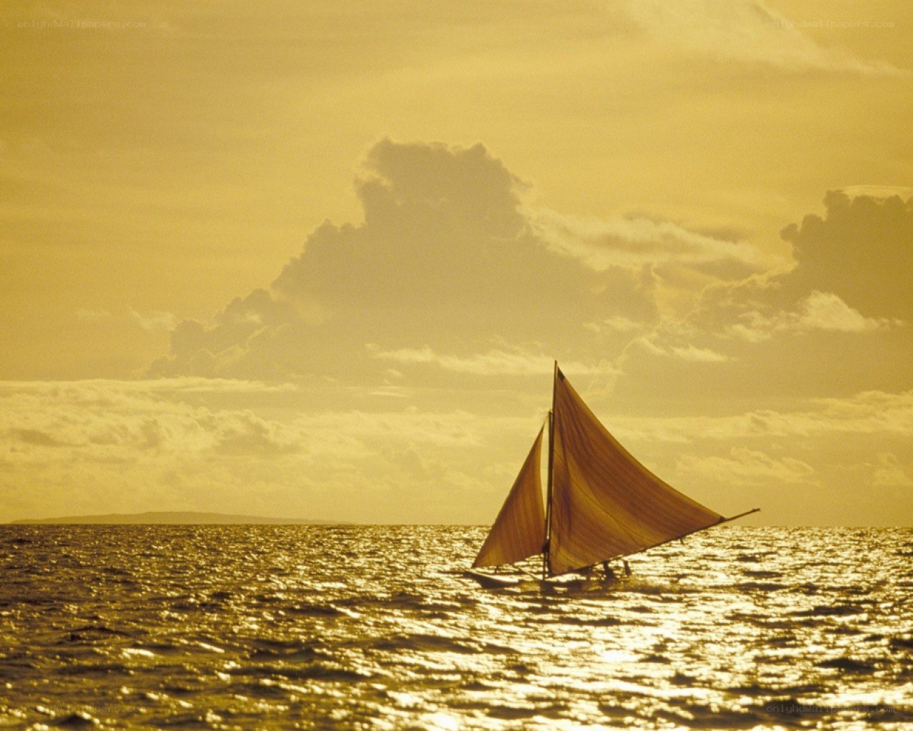 sailboat at golden sunset