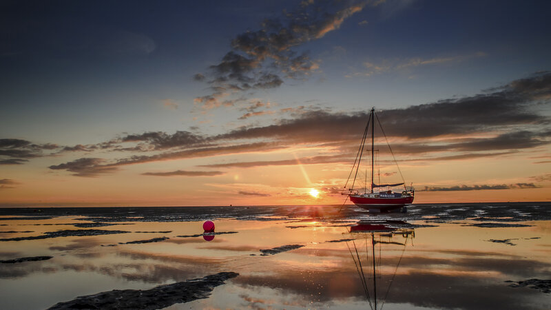 Sailboat at Low Tide — Orange