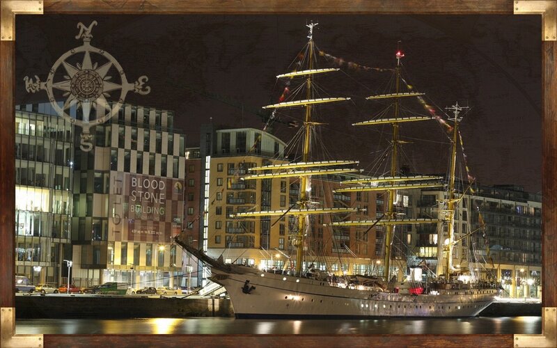 Sailboat at night in city
