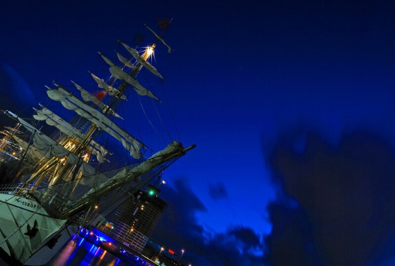 Sailboat at night in port