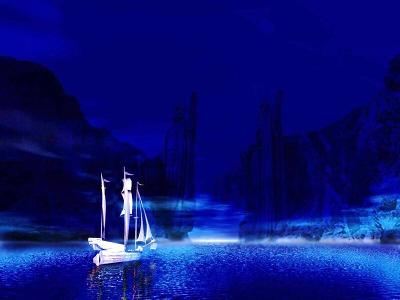 sailboat at night on a blue sea