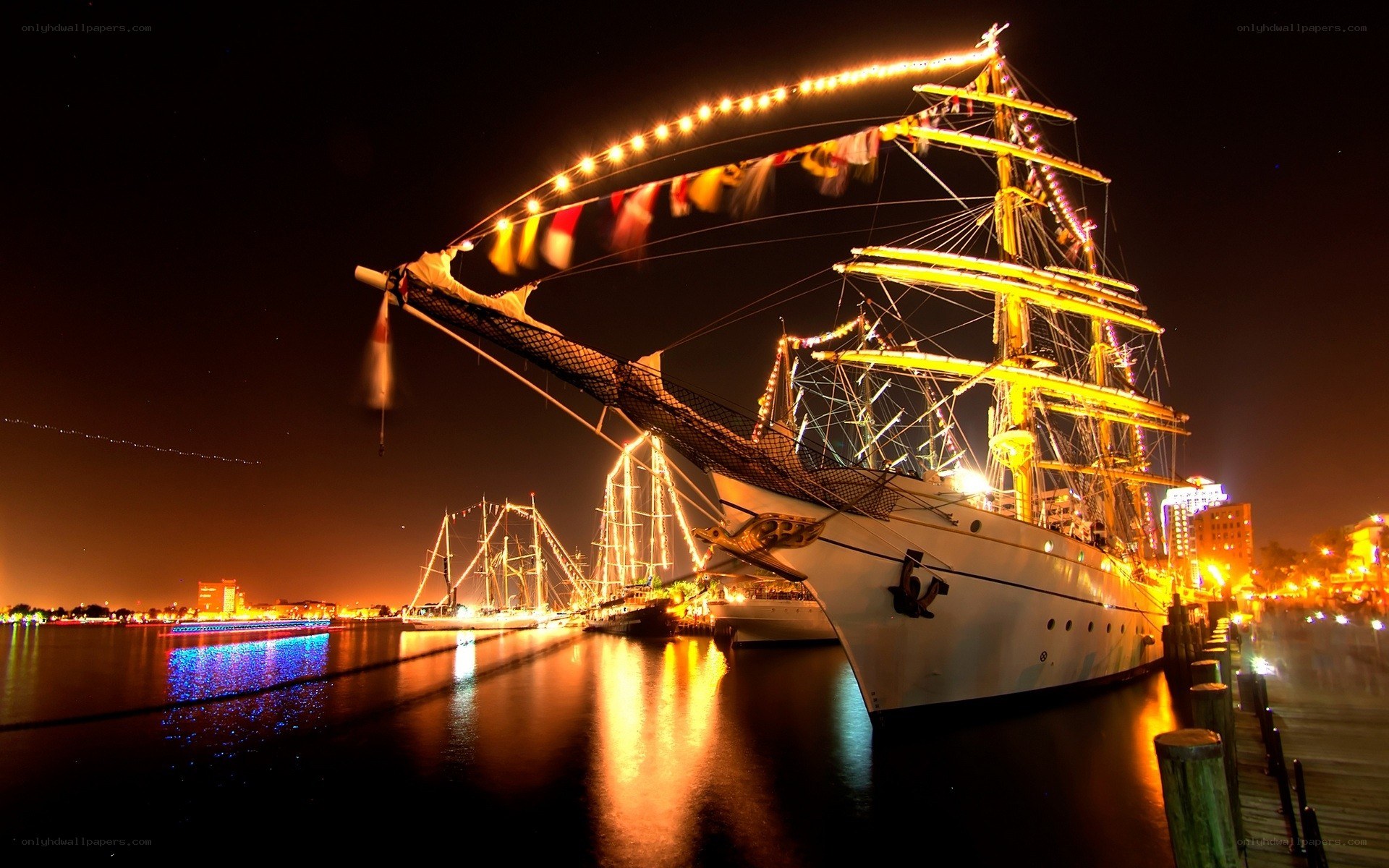 sailboat at night with lights