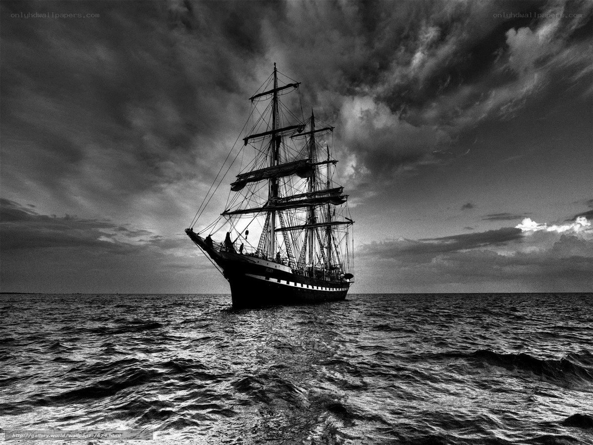 sailboat at sea in black and white