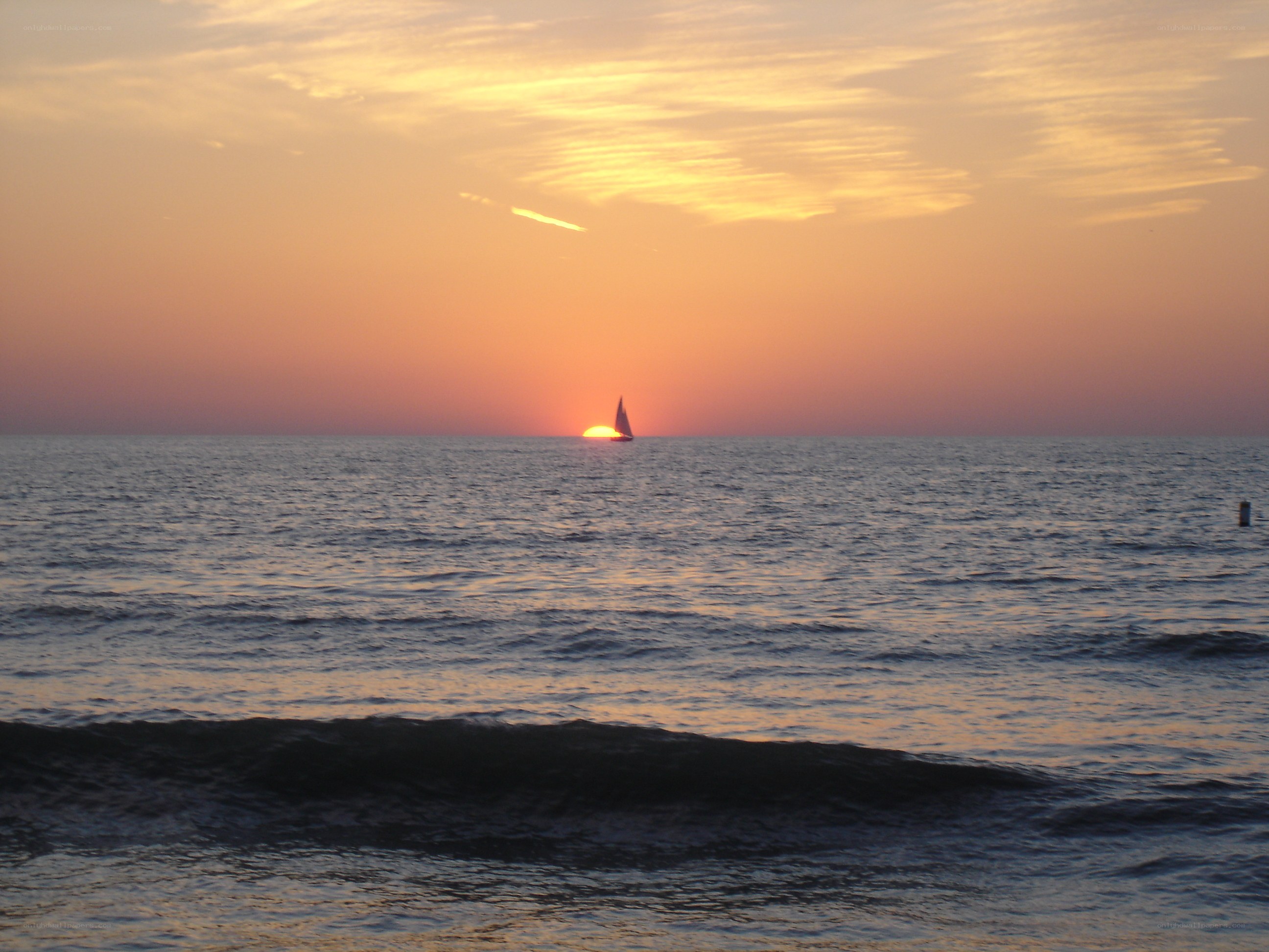 sailboat at sunset