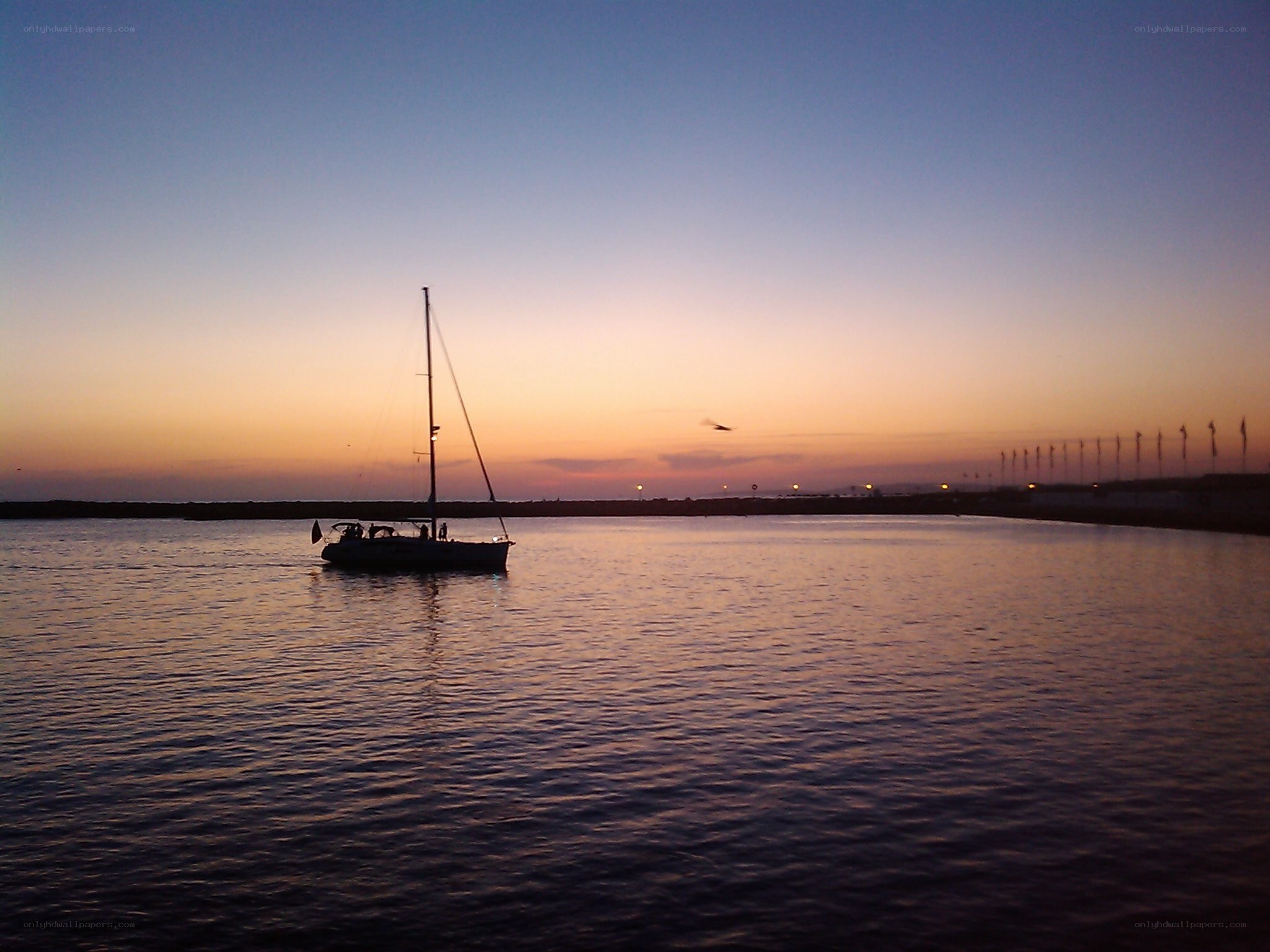 sailboat at sunset