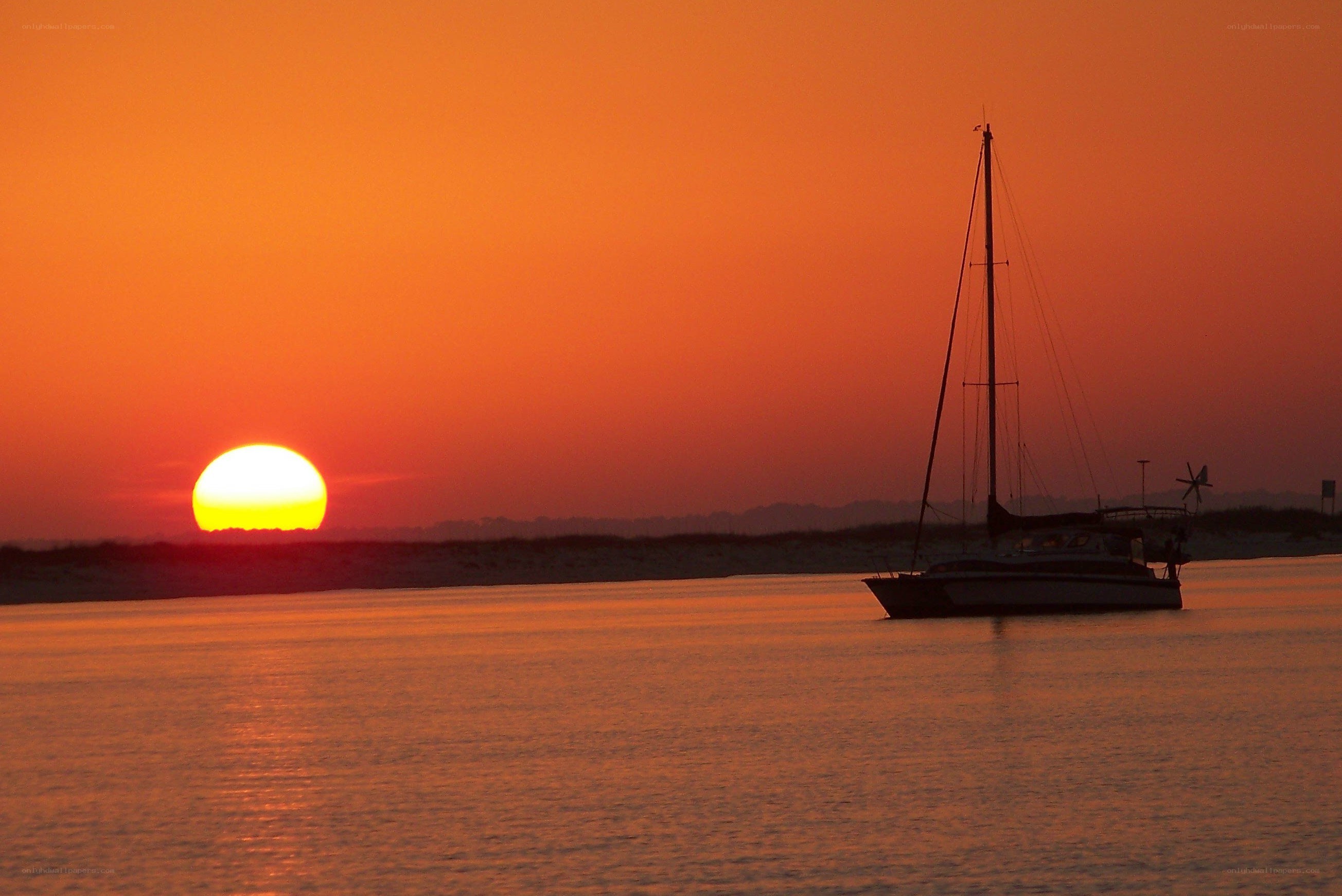 sailboat at sunset