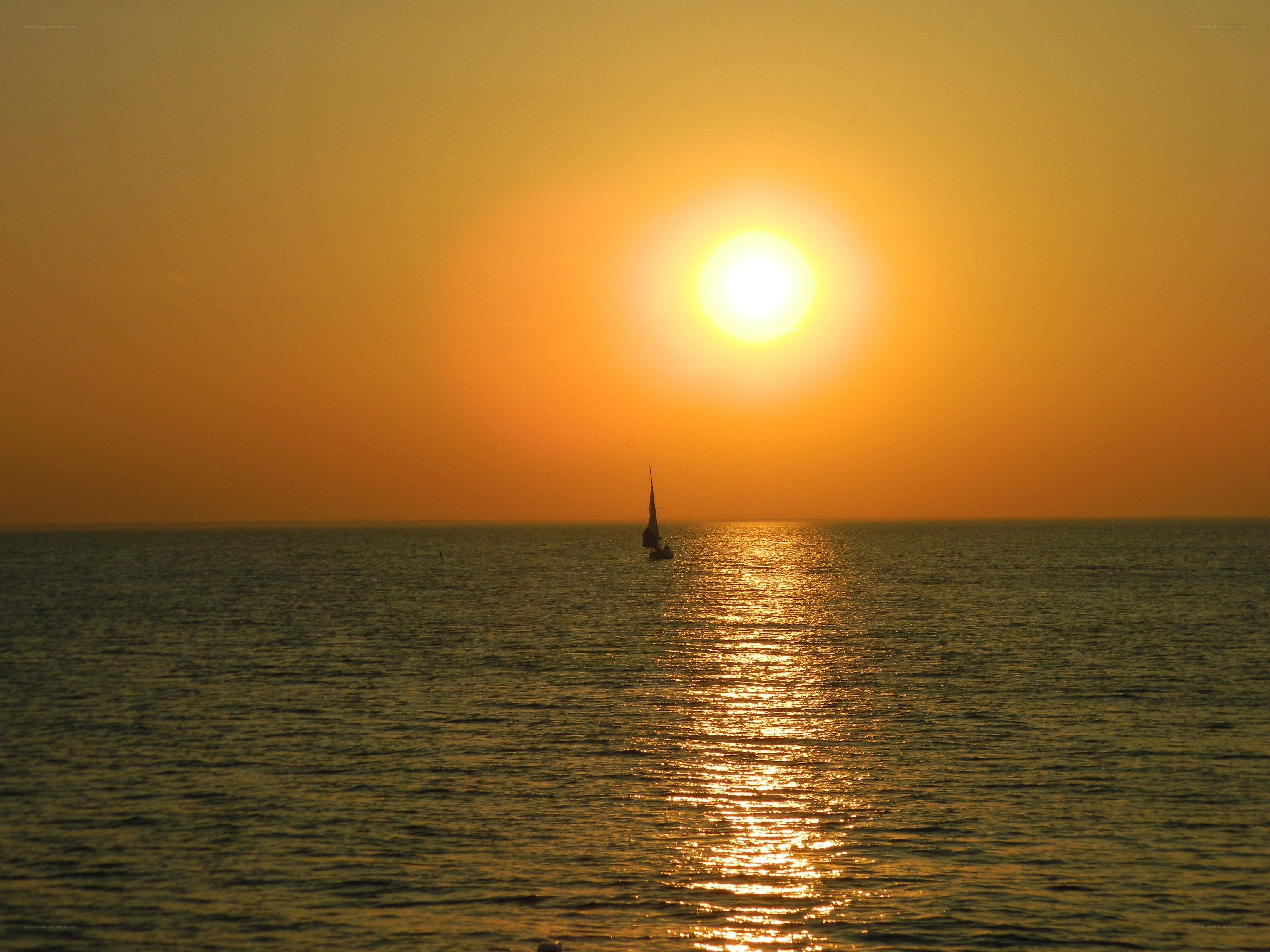 sailboat at sunset