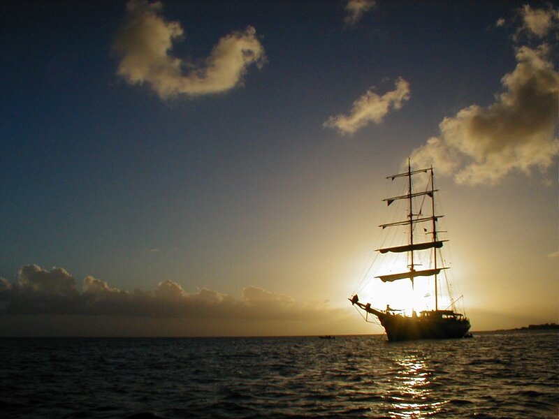 Sailboat at Sunset — Blue, Dramatic, Photograph, Ocean, Sky, Clouds, Yellow