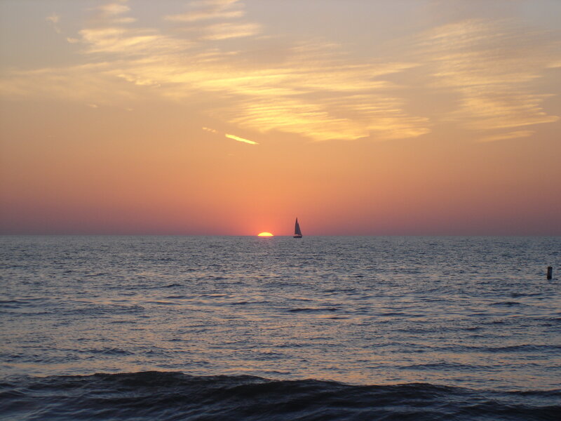 Sailboat at Sunset — Clouds