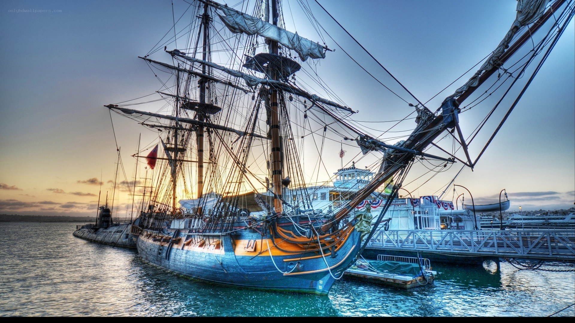 sailboat at sunset in harbor