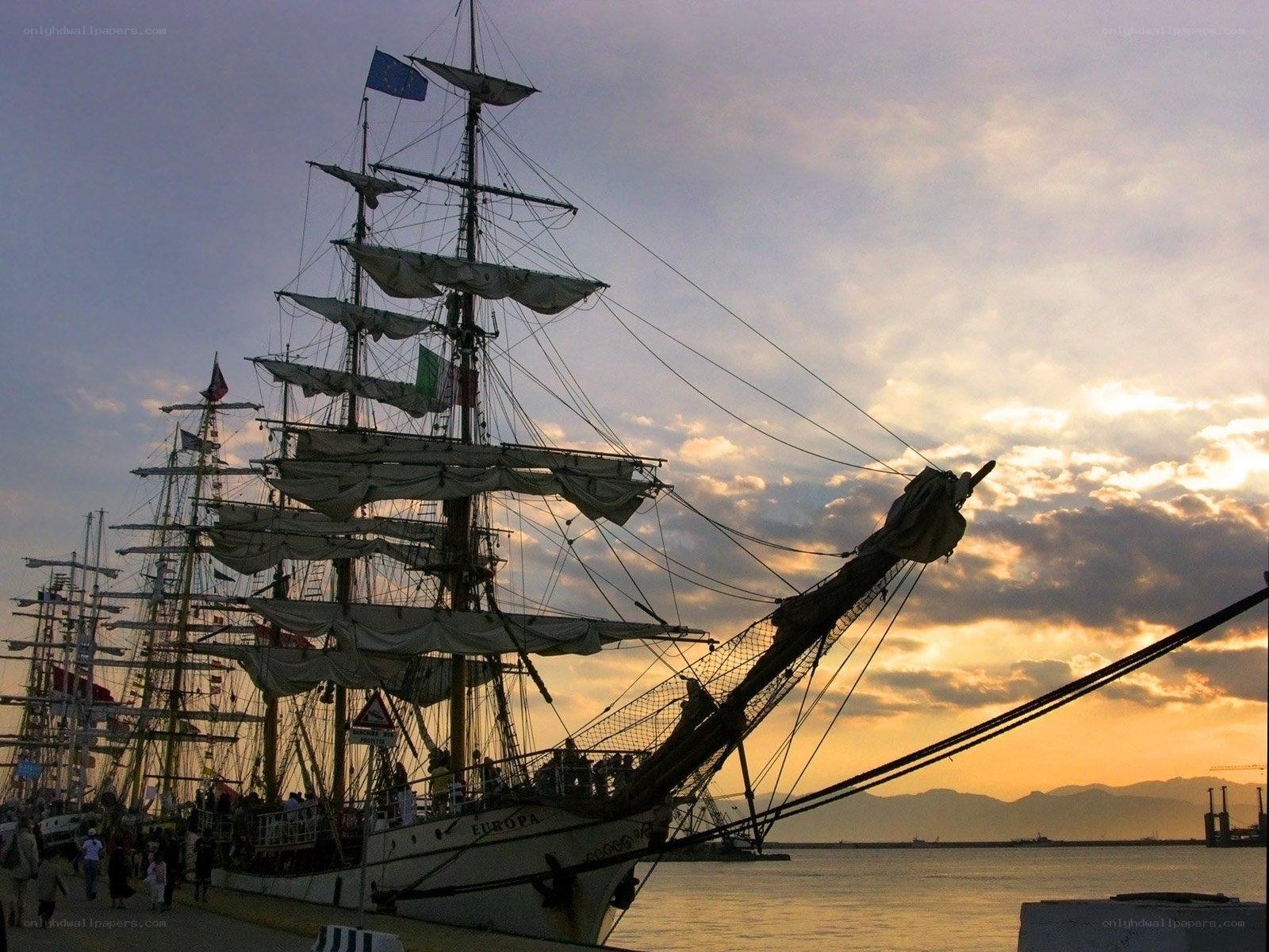 Sailboat at sunset in port