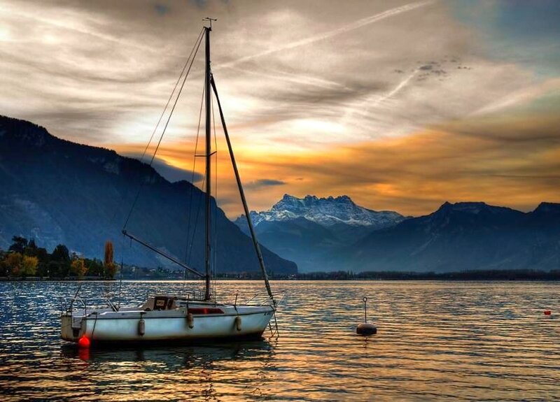 Sailboat at sunset on a lake