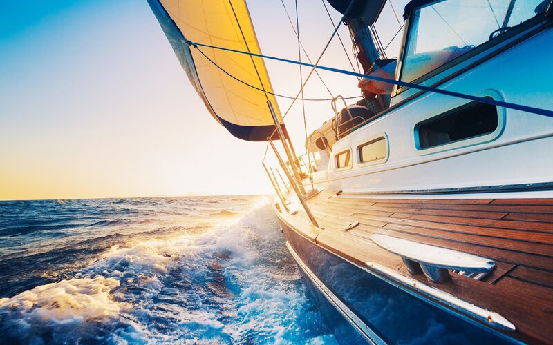 Sailboat at sunset on the ocean