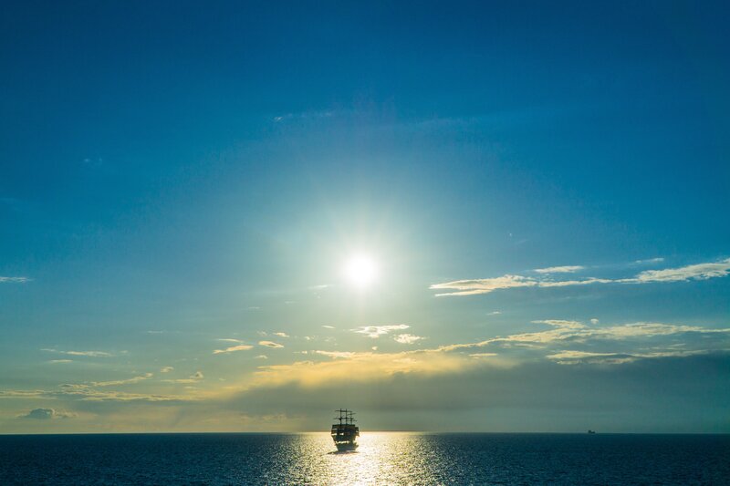 sailboat at sunset on the ocean