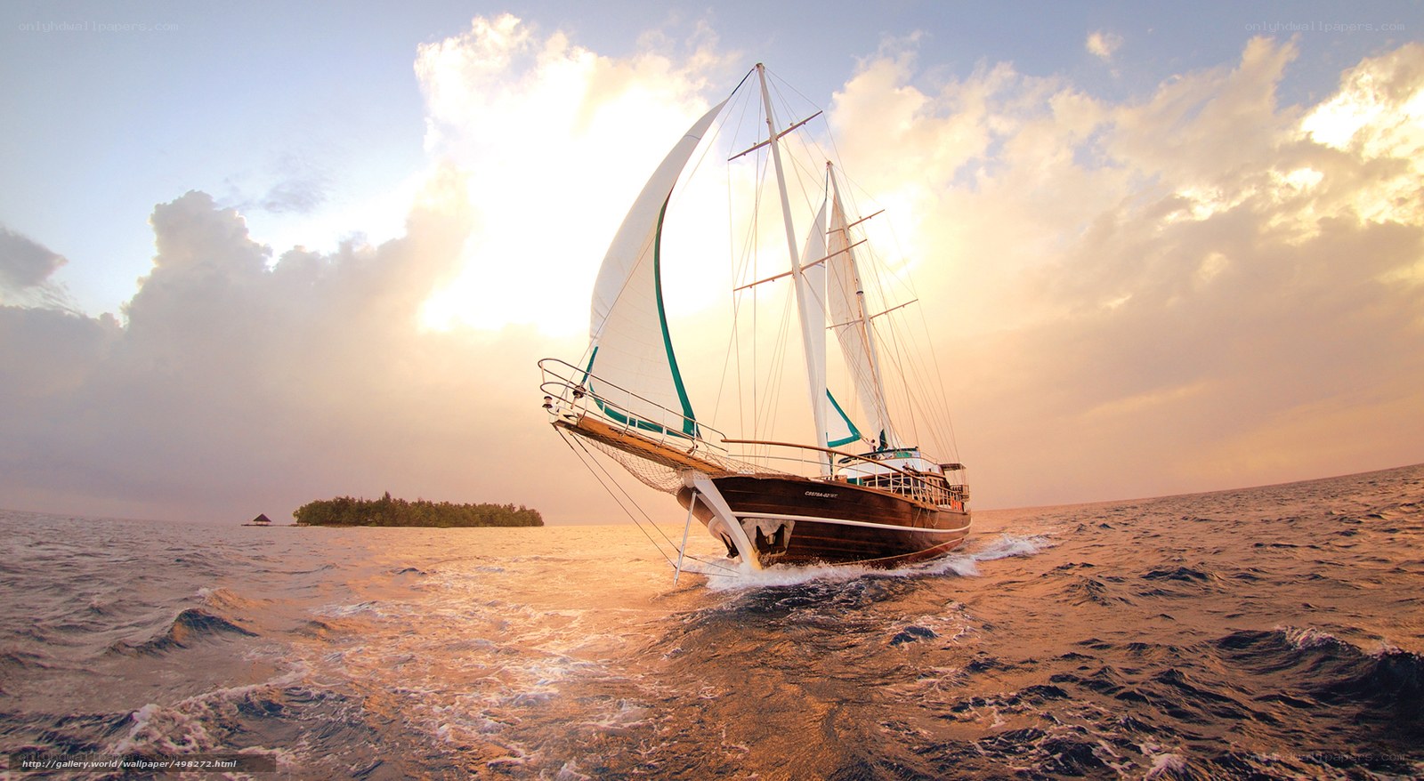 Sailboat at sunset on the ocean