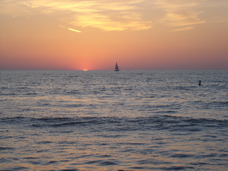 sailboat at sunset on the sea
