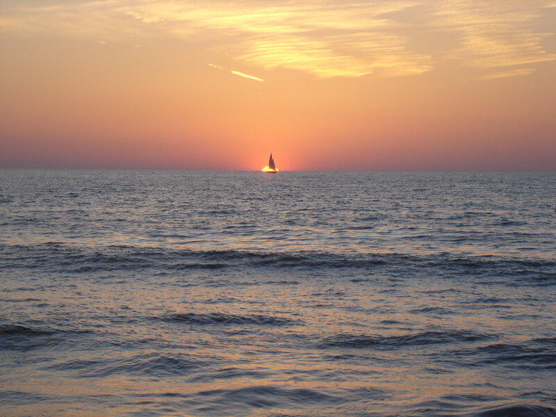 sailboat at sunset on the sea