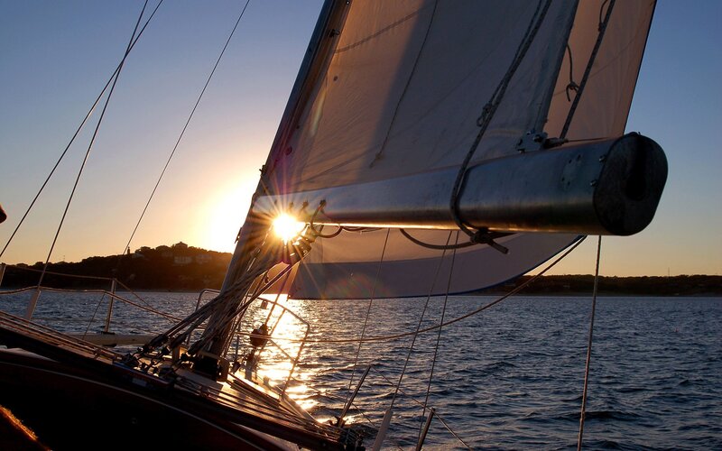 sailboat at sunset on the water