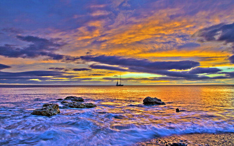 Sailboat at Sunset — Orange, Dramatic, Photograph, Ocean, Rocks