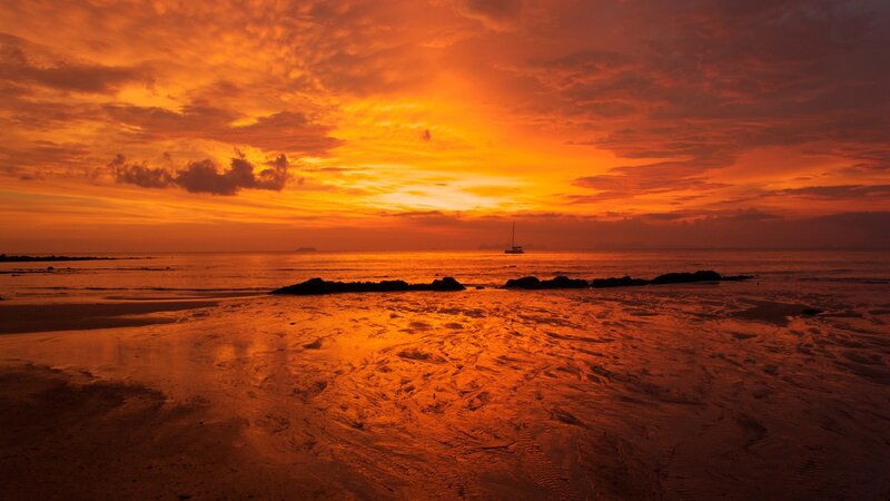Sailboat at Sunset — Orange, Dramatic, Photograph, Ocean, Sky, Rocks