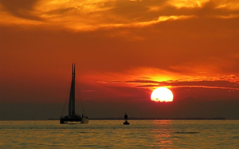 Sailboat at Sunset — Orange, Dramatic, Photograph, Sun, Buoy, Clouds