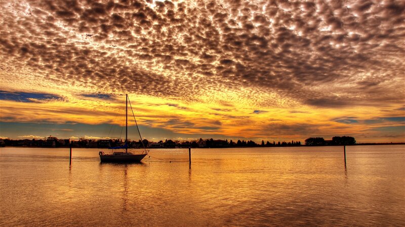 Sailboat at Sunset — Orange, Dramatic, Photograph