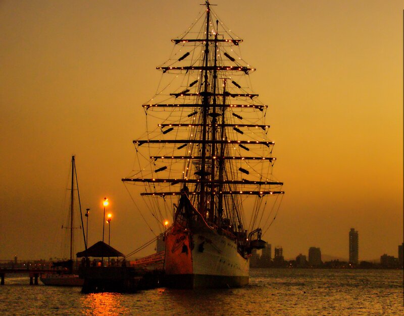 Sailboat at Sunset — Orange, Serene, Photograph, City Skyline