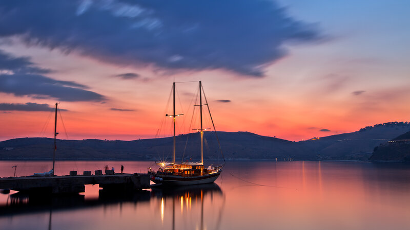 Sailboat at Sunset — Orange, Serene, Photograph, Dock, Mountains
