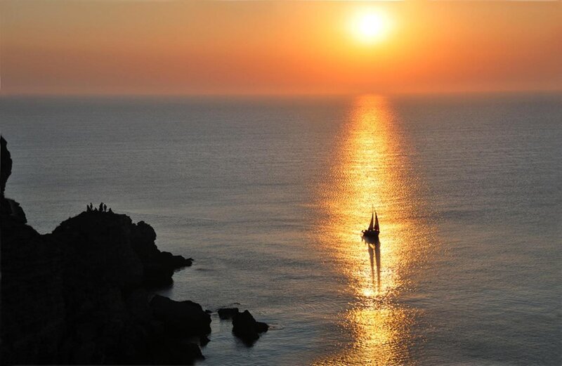 Sailboat at Sunset — Orange, Serene, Photograph, Ocean, Cliffs