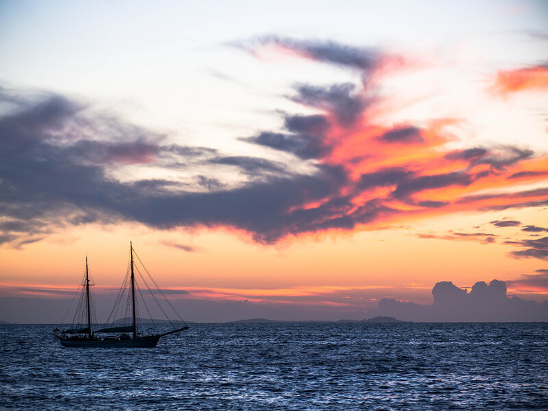 Sailboat at Sunset — Orange, Serene, Photograph, Ocean, Sky, Clouds