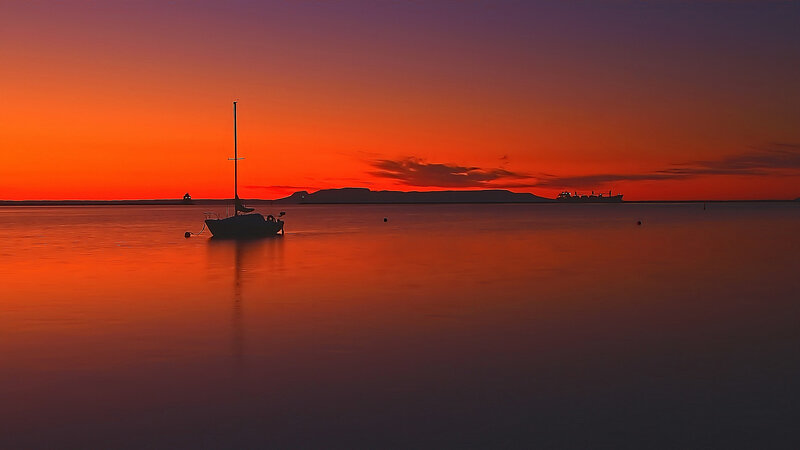 Sailboat at Sunset — Orange, Serene, Photograph, Ship