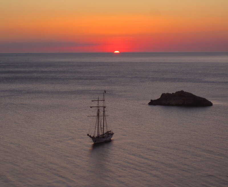 Sailboat at Sunset — Orange, Serene, Photograph, Sun, Island