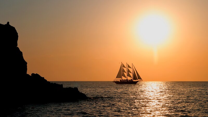 Sailboat at Sunset — Orange, Serene, Photograph, Sun, Sea, Cliff