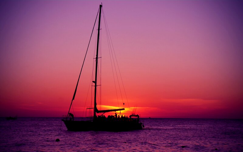 Sailboat at Sunset — Purple, Dramatic, Photograph, People