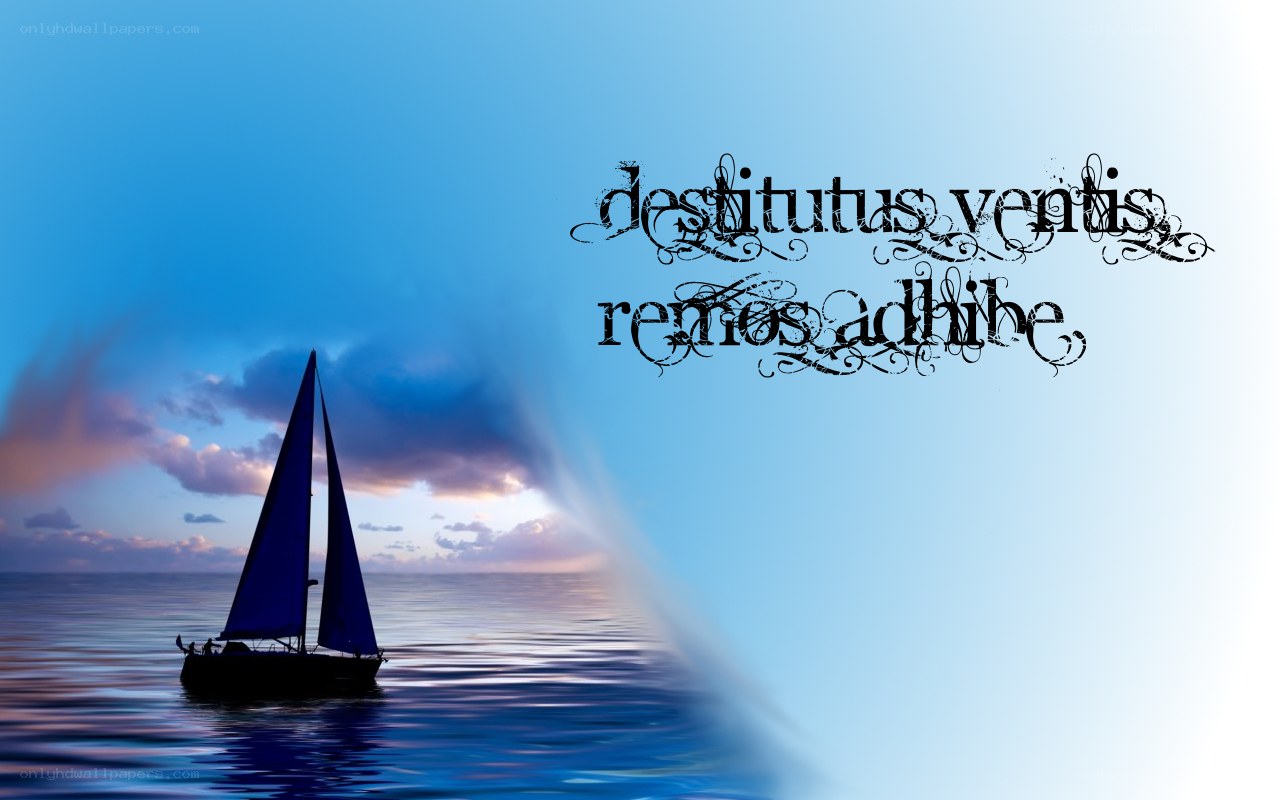 sailboat at sunset with text