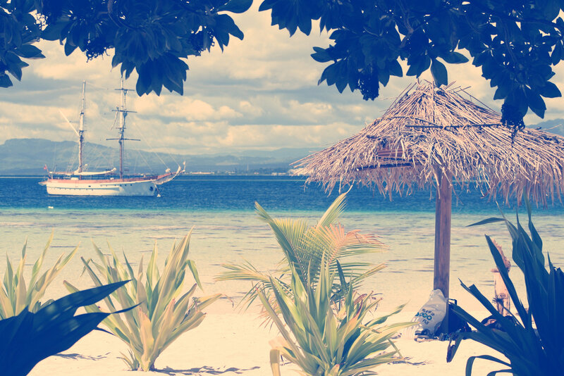 Sailboat at Tropical Beach — Blue