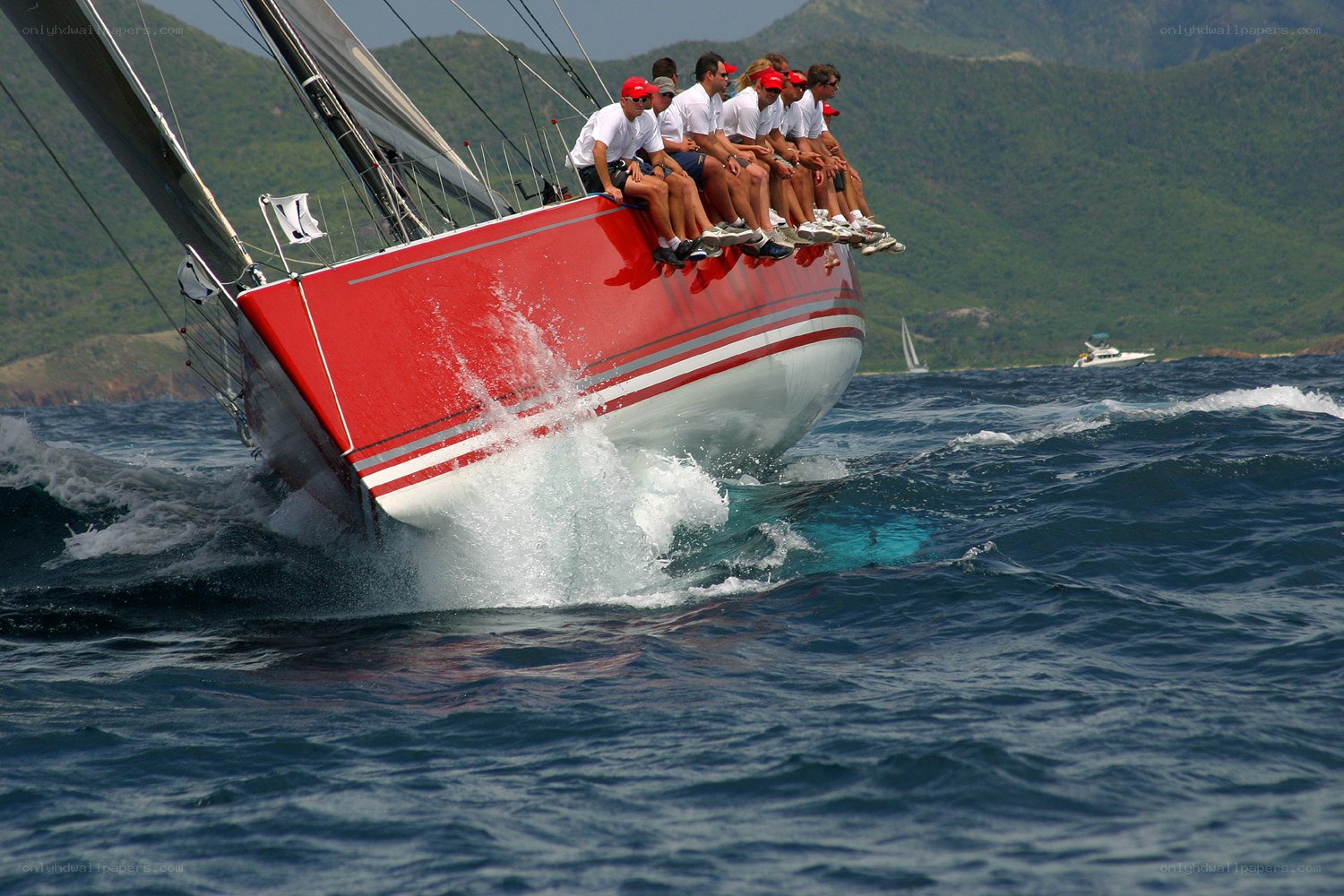 Sailboat crew in action
