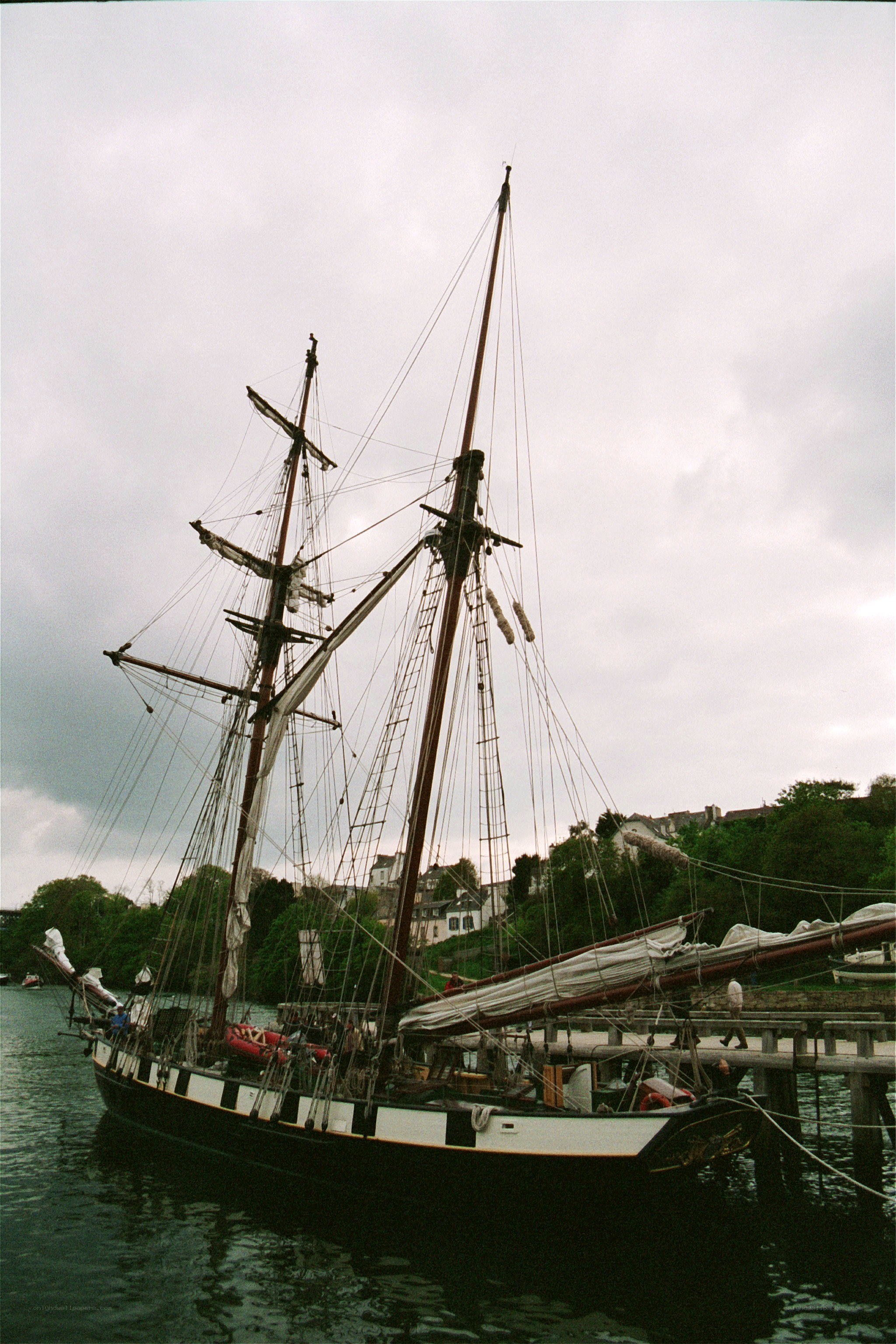 sailboat docked at harbor