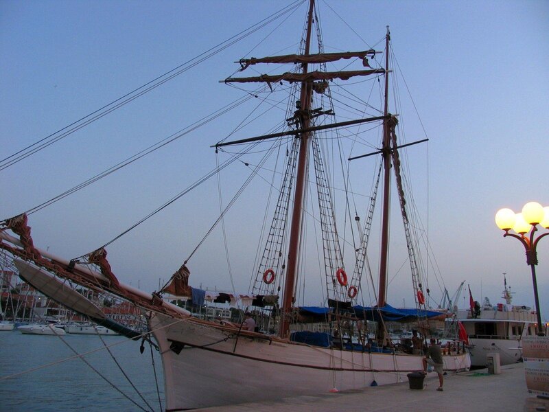 Sailboat docked at harbor