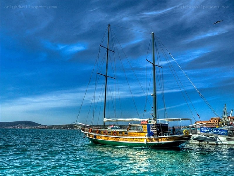 Sailboat in a blue harbor