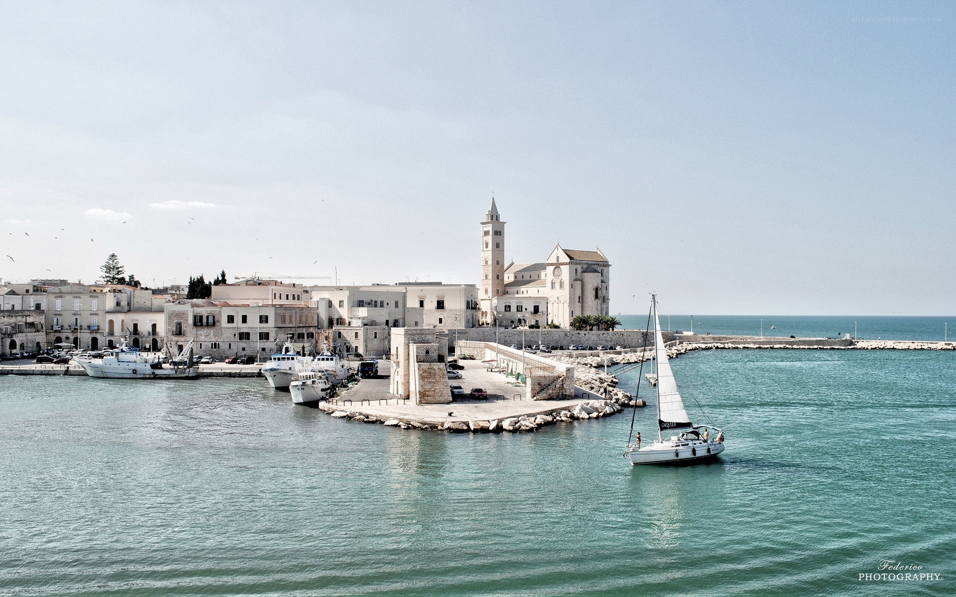 Sailboat in a coastal harbor