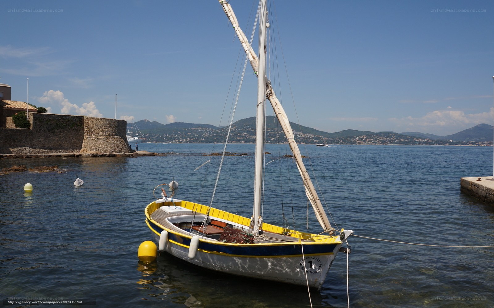 Sailboat in a coastal harbor
