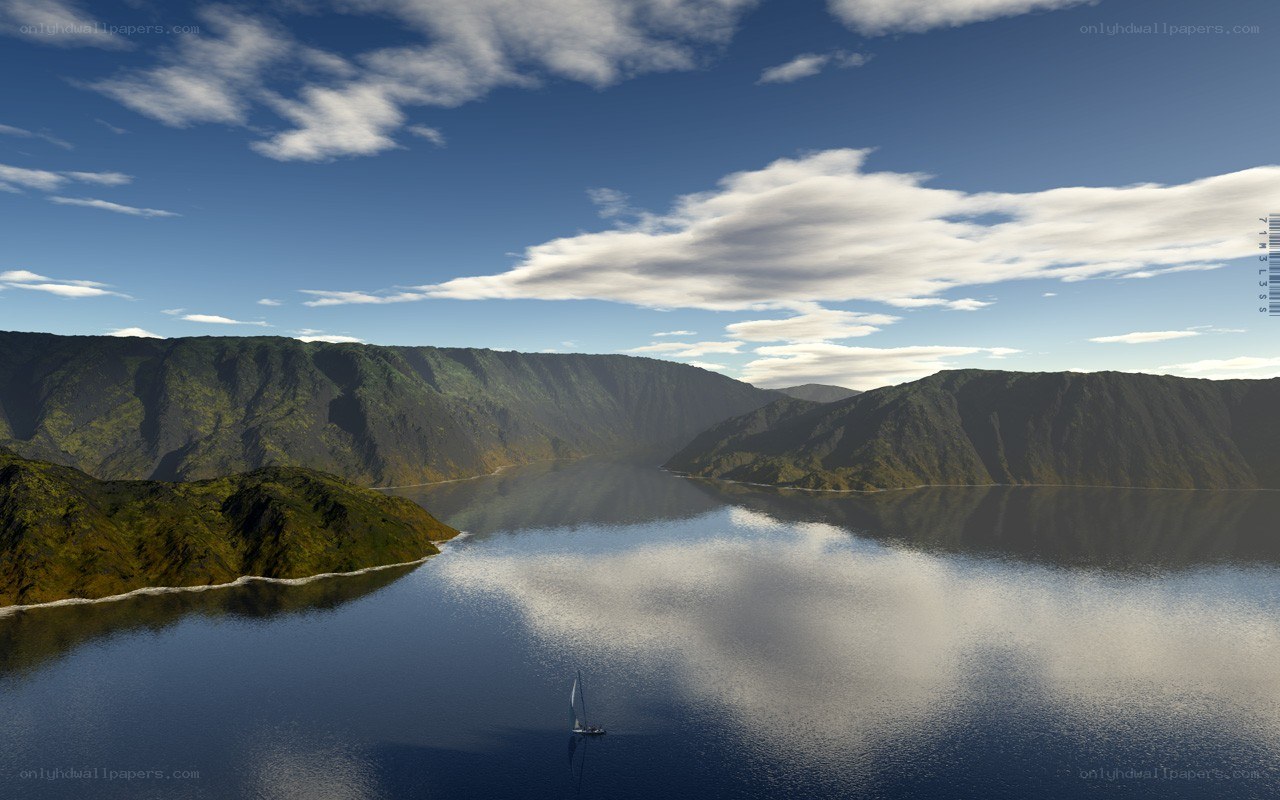 sailboat in a mountainous bay