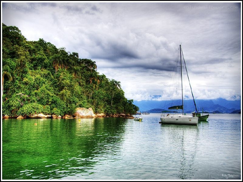 Sailboat in a tropical bay