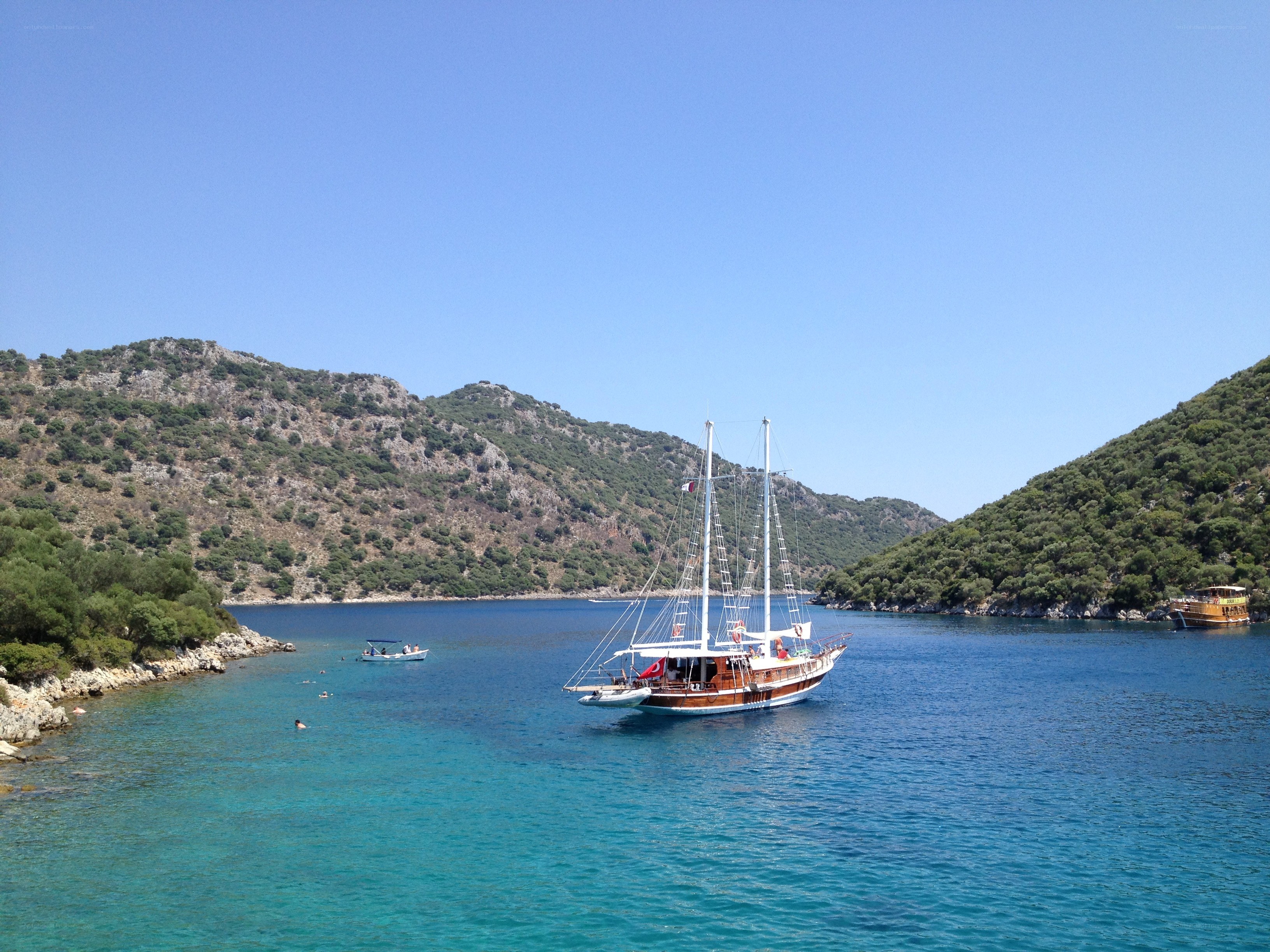 Sailboat in a turquoise bay