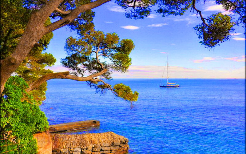 Sailboat in Blue Sea — Serene