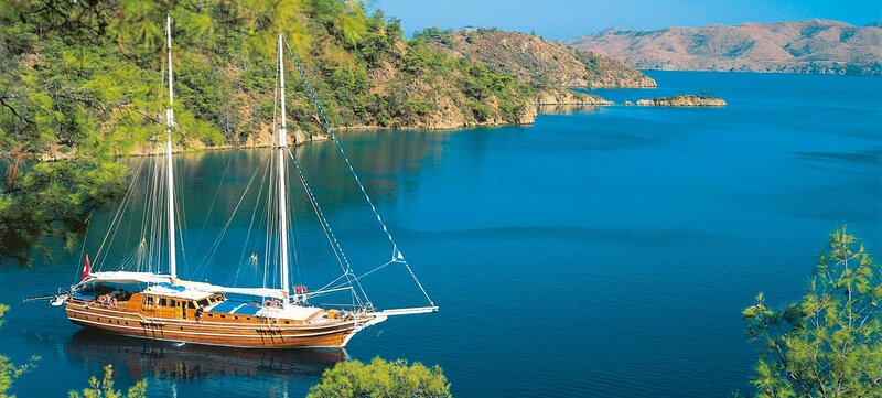 Sailboat in Blue Water — Serene, Afternoon, Photograph, Trees